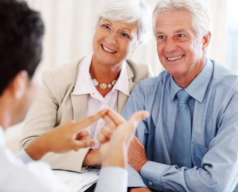 1-Senior-Couple-Talking-with-Advisor-Copy
